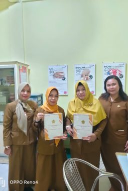 PERJANJIAN KERJA SAMA (PKS) DINAS KEPENDUDUKAN DAN PENCATATAN SIPIL KABUPATEN KARIMUN DENGAN BIDAN HJ. YELI S.Tr. Keb, SE, MM